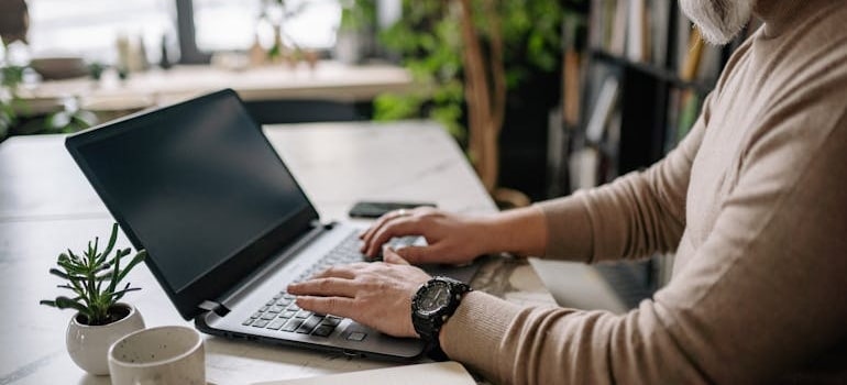 A person checking a company's online presense while choosing a digital marketing agency