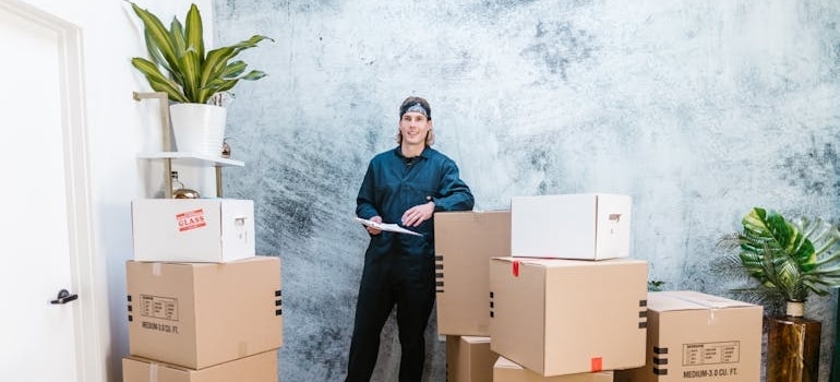 An employee of a moving company that knows that winter is the best time for SEO and is prepared for the busy season