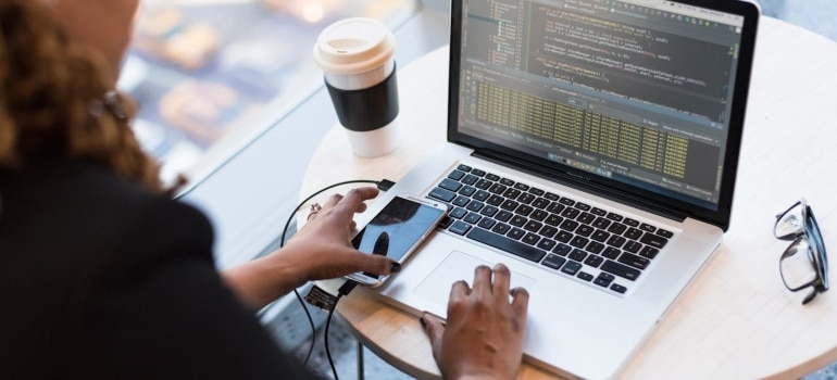 a woman working on her laptop