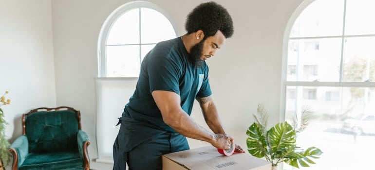 A mover that knows why their moving company ranks in one city but not another packing boxes