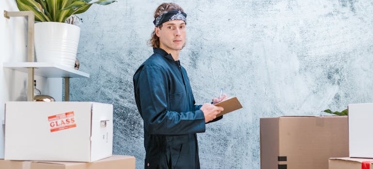 An employee of a company that knows what review velocity means for moving company SEO