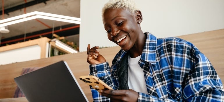 A person reading a message from a company that knows how keep customers when relocating your business