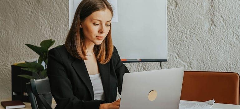 A moving company owner doing research on how to compete with other movers